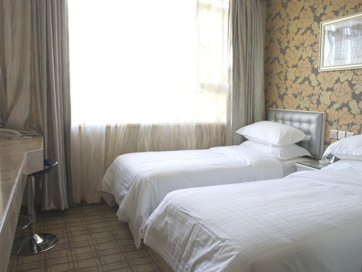 Xinyijia City Hotel Urumqi Exterior photo